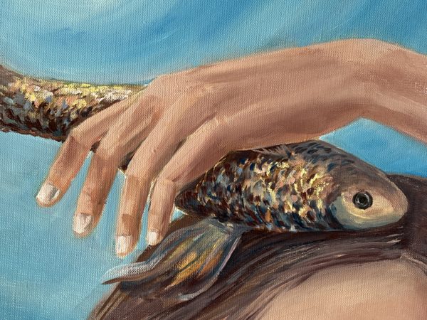 Embracing Dreams — detail, hands gently holding a golden fish